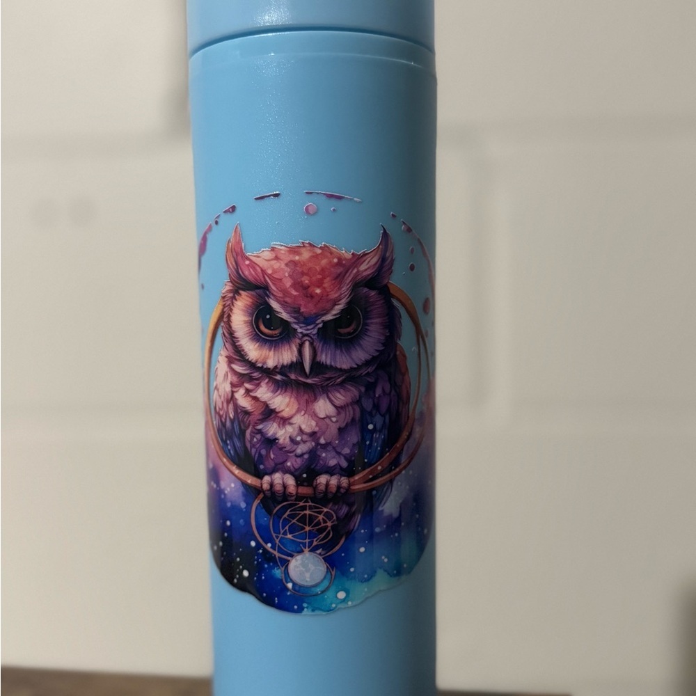 Blue Owl plastic tumbler has matching straw
